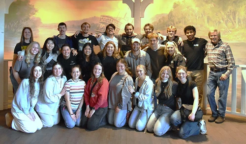 Twenty-two students embark on the Vocation Trip, which allows them to discover their unique abilities and explore how to employ these skills in their professional fields upon graduation. The group poses while visiting the Arabia Steamboat Museum.